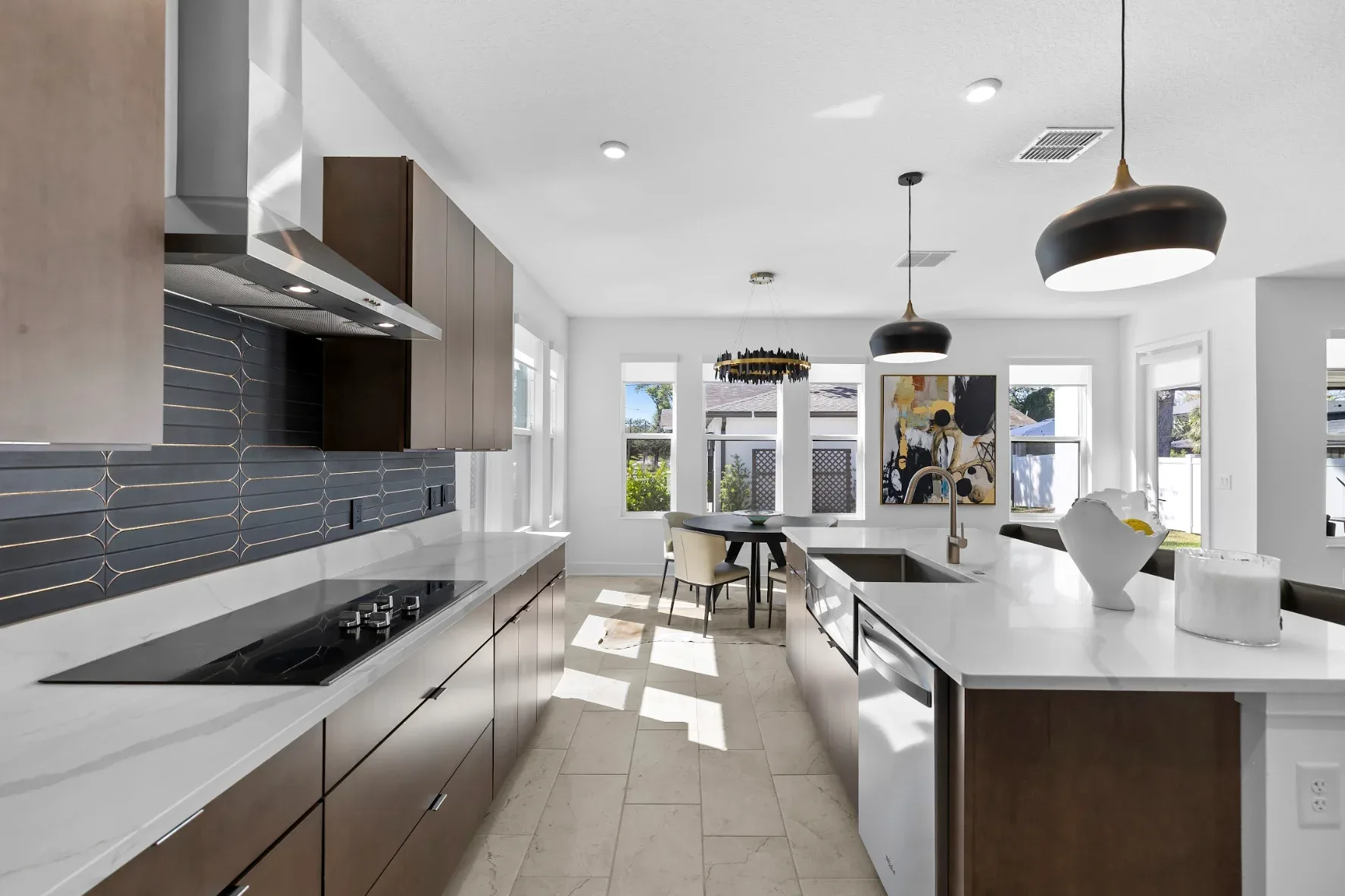 Curated dining room with layered lighting and textiles, Tampa interior designer