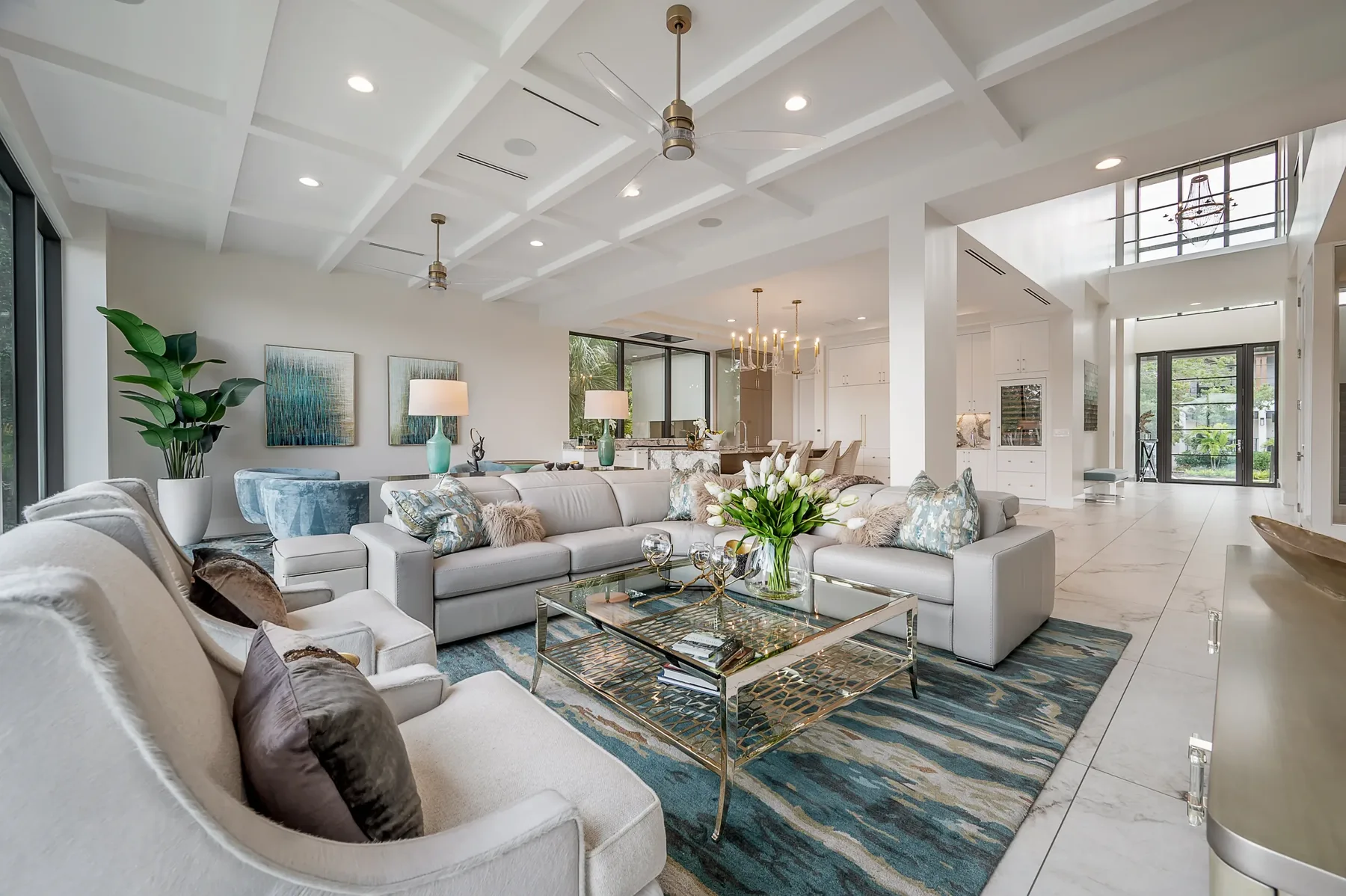 Elegant seating vignette with art and accessories, luxury interior design Tampa